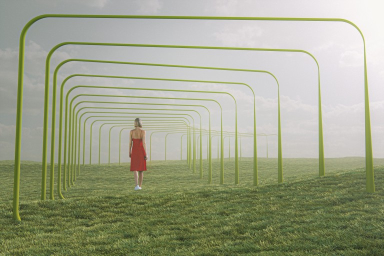 Young woman walking in fantasy meadow
